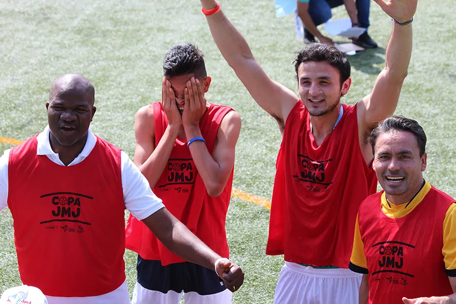 Young people in sports jerseys react after winning a friendly soccer game at World Youth Day in Panama in 2019.?w=200&h=150