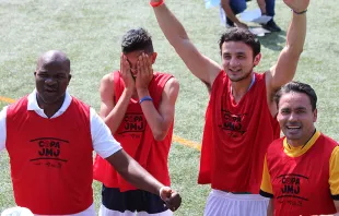 Young people in sports jerseys react after winning a friendly soccer game at World Youth Day in Panama in 2019. Jonah McKeown/CNA