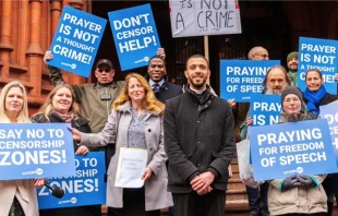 Isabel Vaughan-Spruce (center-left) and Father Sean Gough (center-right) celebrate their legal win outside the Birmingham Magistrates Court in Birmingham, England, on Feb. 16, 2023. Credit: March for Life UK