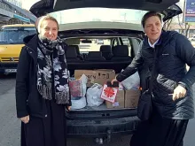 Religious sisters in Ukraine deliver supplies from Caritas.
