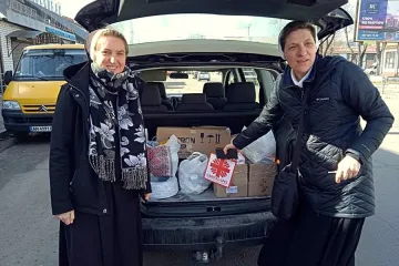 Religious sisters in Ukraine deliver supplies from Caritas.