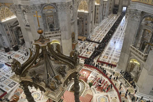 The mortal remains of Pope Emeritus Benedict XVI were moved early in the morning on Jan. 2, 2023, from his former residence in the Vatican's Mater Ecclesiae Monastery to St. Peter's Basilica, where the late pope is lying in state through Jan. 4. Thousands waited in line to pay their respects. Vatican Media
