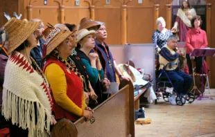 Members of the Sts’ailes First Nation at Holy Rosary Cathedral last year for the first Mass to integrate a First Nation language.  A Cardus report presents the voices of Indigenous Canadians speaking about their faith and distinguishing it from the traditional spirituality they’re often associated with. Photo courtesy Nicholas Elbers, 2022