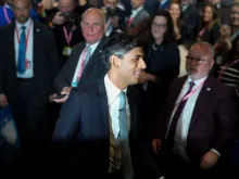 Prime Minister Rishi Sunak leaves following his speech during the final day of the Conservative Party Conference on Oct. 4, 2023, in Manchester, England.