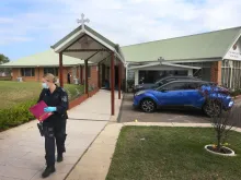 Forensic police are seen at Christ the Good Shepherd Church in the Sydney suburb of Wakeley, Australia, on April 16, 2024. Hundreds clashed with police in western Sydney on April 15 after Bishop Mar Mari Emmanuel was stabbed at the alter during a service at an Assyrian church in Wakeley. New South Wales police have declared the attack a terror event. Police apprehended a 16-year-old in connection with the attack.