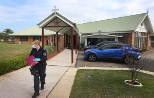Forensic police are seen at Christ the Good Shepherd Church in the Sydney suburb of Wakeley, Australia, on April 16, 2024. Hundreds clashed with police in western Sydney on April 15 after Bishop Mar Mari Emmanuel was stabbed at the alter during a service at an Assyrian church in Wakeley. New South Wales police have declared the attack a terror event. Police apprehended a 16-year-old in connection with the attack. Credit: Lisa Maree Williams/Getty Images