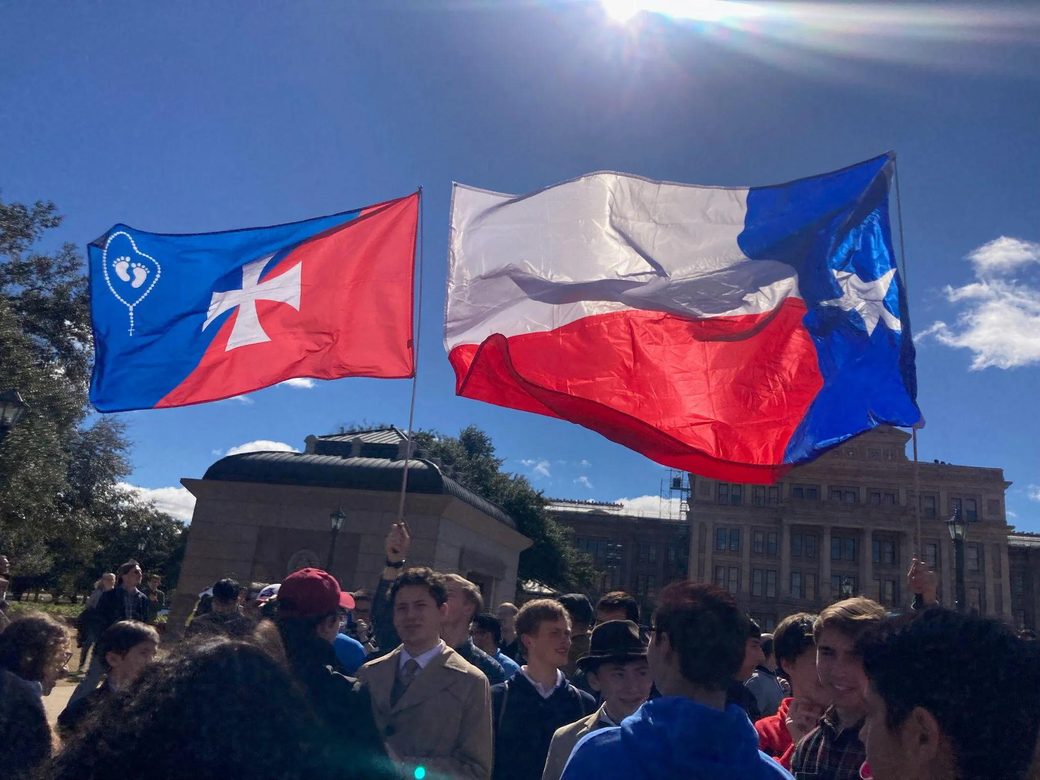 Members of the Houston-based Catholic Organization of Life carry their flag, alongside the state flag, at the 2024 Texas March for Life.?w=200&h=150