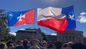 Members of the Houston-based Catholic Organization of Life carry their flag, alongside the state flag, at the 2024 Texas March for Life.
