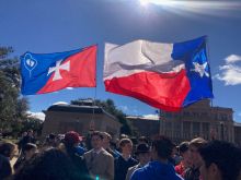 Members of the Houston-based Catholic Organization of Life carry their flag, alongside the state flag, at the 2024 Texas March for Life.