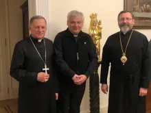 Papal envoy Cardinal Konrad Krajewski meets with Archbishop Mieczysław Mokrzycki and Major Archbishop Sviatoslav Shevchuk in Ukraine on March 8, 2022.