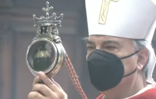 Archbishop Domenico Battaglia holds a reliquary containing St. Januarius’ liquefied blood in Naples Cathedral, Italy, Sept. 19, 2021. Screenshot from Chiesa di Napoli YouTube channel.