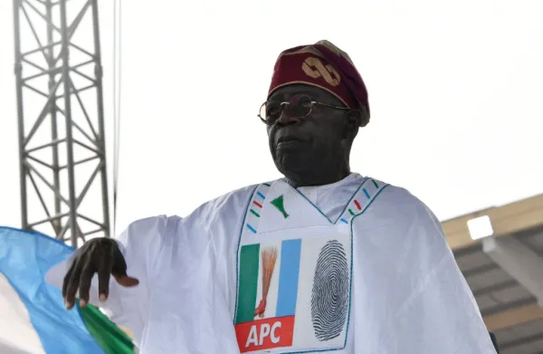 Candidate of the ruling All Progressives Congress (APC) Bola Tinubu gestures during the final campaign rally of the party at Teslim Balogun Stadium in Lagos, on Feb. 21, 2023, ahead of the Nigerian presidential election scheduled for February 25, 2023. Pius Utomi Ekpei/AFP via Getty Images