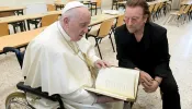 Pope Francis meets Bono at the launch of the Scholas Occurrentes International Educational Movement at the Pontifical Urban University in Rome, May 19, 2022.