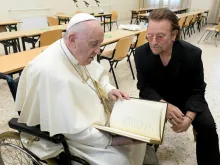 Pope Francis meets Bono at the launch of the Scholas Occurrentes International Educational Movement at the Pontifical Urban University in Rome, May 19, 2022.
