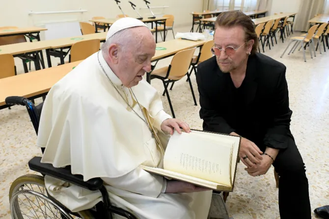 Pope Francis meets Bono at the launch of the Scholas Occurrentes International Educational Movement at the Pontifical Urban University in Rome, May 19, 2022