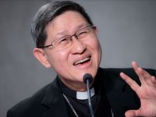 Cardinal Luis Antonio Tagle speaks at a Vatican press conference presenting the 2021 World Mission Day, Oct. 21, 2021.