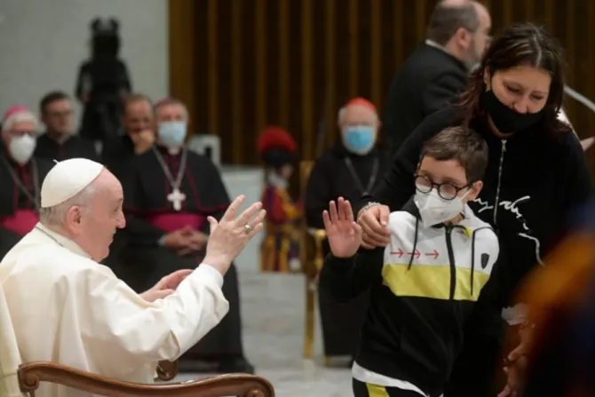 Pope Francis with 10-year-old Paolo Bonavita at his general audience in the Paul VI Hall at the Vatican, Oct. 20, 2021