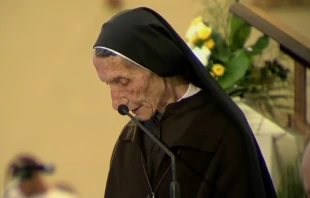 Pope Francis listens as Sister Marije Kaleta speaks in Tirana’s St. Paul Cathedral, Albania, Sunday, Sept. 21, 2014. Screenshot from Vatican News YouTube channel.