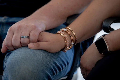 Michael and Deanna Johnston of Tyler, Texas, hold hands during an interview.?w=200&h=150