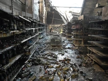 A photograph taken on June 28, 2022 shows charred goods in a grocery store of the destroyed Amstor mall in Kremenchuk, one day after it was hit by a Russian missile strike according to Ukrainian authorities.