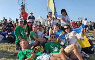 Marina Aleykseyeva, 31, from Kiev, Ukraine, (second from left with a pink baseball cap), together with fellow pilgrims from Ukraine, attended World Youth Day in Lisbon, Portugal, Aug. 1–6, 2023. She said they traveled to the international gathering to pray for peace in their country. Hannah Brockhaus/CNA