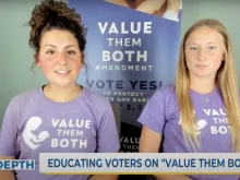Kansas high school students Hannah Joerger (left) and Mara Loughman have been knocking on doors and encouraging voters to say yes to the Value Them Both amendment initiative Aug. 2, 2022.