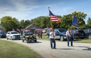 Veterans precede a motorcade for Fr. Emil Kapaun's remains outside his hometown church, St. John Nepomucene, in Pilsen, Kan., Sept. 25, 2021. Chris Riggs/Diocese of Wichita
