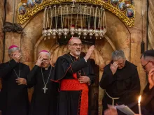 Cardinal Pierbattista Pizzaballa, Latin patriarch of Jerusalem, imparts the blessing in front of the aedicule of the Holy Sepulcher on Friday, Oct. 27, 2023, where Jesus’ tomb is venerated. Here ends the Way of the Cross that the Franciscan friars celebrate every Friday.