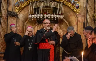 Cardinal Pierbattista Pizzaballa, Latin patriarch of Jerusalem, imparts the blessing in front of the aedicule of the Holy Sepulcher on Friday, Oct. 27, 2023, where Jesus’ tomb is venerated. Here ends the Way of the Cross that the Franciscan friars celebrate every Friday. Credit: Marinella Bandini