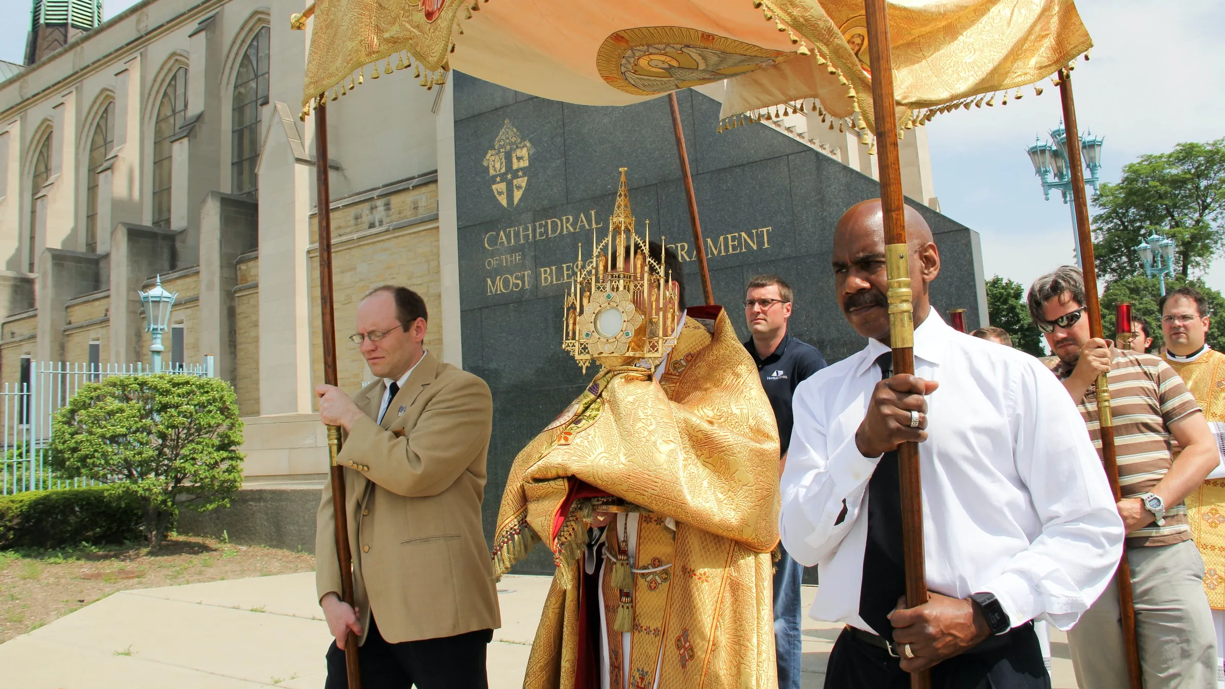 Archbishop Allen H. Vigneron carries the Blessed Sacrament in procession during the feast of Corpus Christi in June 2016. This year, the Archdiocese of Detroit is inviting the faithful to take part in a two-mile Eucharistic procession June 19 from the Cathedral of the Most Blessed Sacrament to Sacred Heart Major Seminary in Detroit as part of the launch of a three-year National Eucharistic Revival.?w=200&h=150