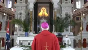 Archbishop Dionisio Guillermo García of Santiago de Cuba prays before an image of Mary in the Basilica National Sanctuary of Our Lady of Charity on March 24, 2024.