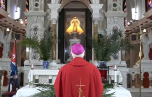 Archbishop Dionisio Guillermo García of Santiago de Cuba prays before an image of Mary in the Basilica National Sanctuary of Our Lady of Charity on March 24, 2024. Credit: Archbishopric of Santiago de Cuba