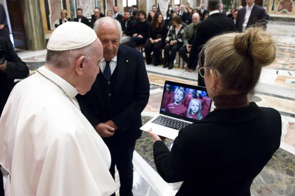 Pope Francis met participants in a Christmas song contest initiative at the Vatican on Nov. 22, 2021. Vatican Media