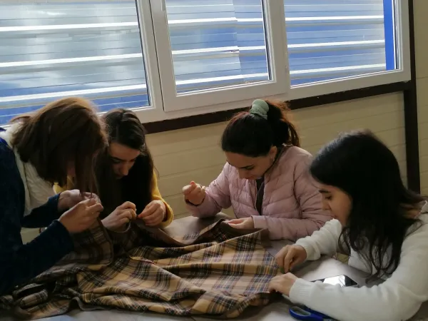 Sewing class at the Antonia Arslan Armenian-Italian Hamalir in Artsakh. The school offers a variety of courses, programs, and educational opportunities. Photo courtesy of Siobhan Nash-Marshall