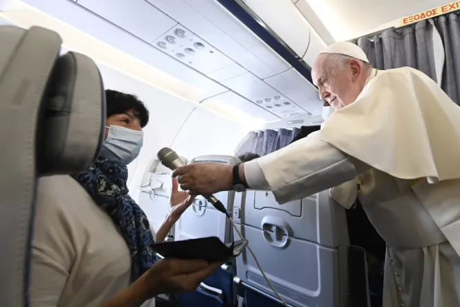 Pope Francis speaks during an in-flight press conference on the journey from Athens to Rome, Dec. 6, 2021