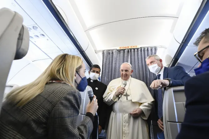 Pope Francis speaks during an in-flight press conference on the journey from Athens to Rome, Dec. 6, 2021