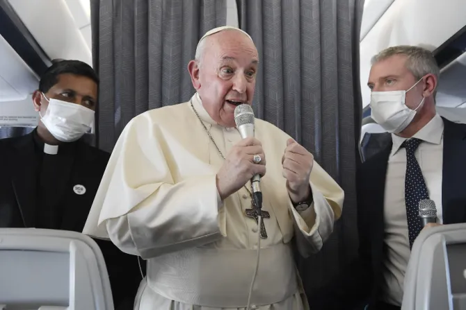 Pope Francis speaks during an in-flight press conference on the journey from Athens to Rome, Dec. 6, 2021.