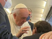 Pope Francis speaks to journalists aboard the papal flight to Malta on April 2, 2022.