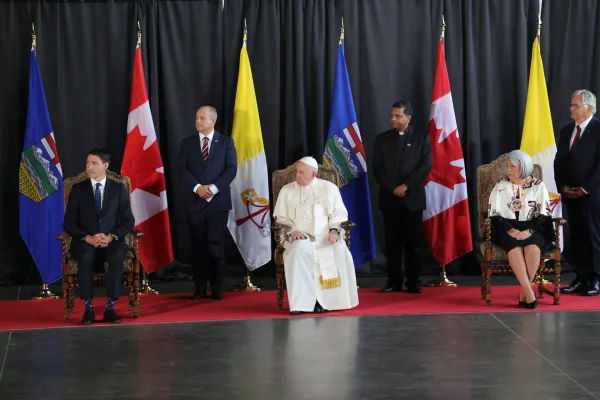 Pope Francis prepares to meet representatives of Canada's indigenous peoples inside a hangar at Edmonton International Airport on July 24, 2022. At far left it Canada Prime Minister Justin Trudeau. Andrea Gagliarducci/CNA