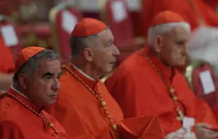 Cardinal Angelo Becciu (left) at the consistory in St. Peter's Basilica, Aug. 27, 2022. Daniel Ibáñez / CNA