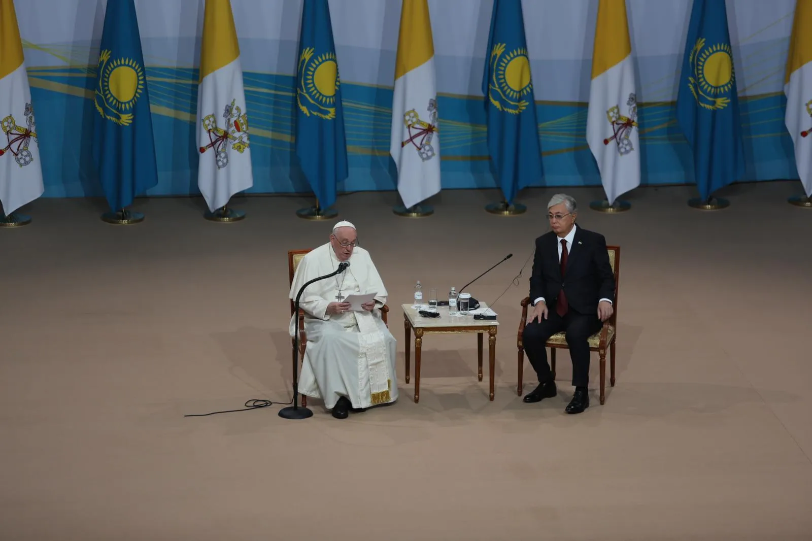 Pope Francis speaks from the stage of the Qazaq Concert Hall in Nur-Sultan, Kazakhstan, Sept 13. 2022. Also onstage is Kazakhstan President Kassym-Jomart Tokayev.?w=200&h=150