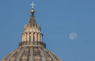 The moon was visible over St. Peter's Basilica, Vatican, on the morning of Oct. 12. 2022. Daniel Ibáñez / CNA