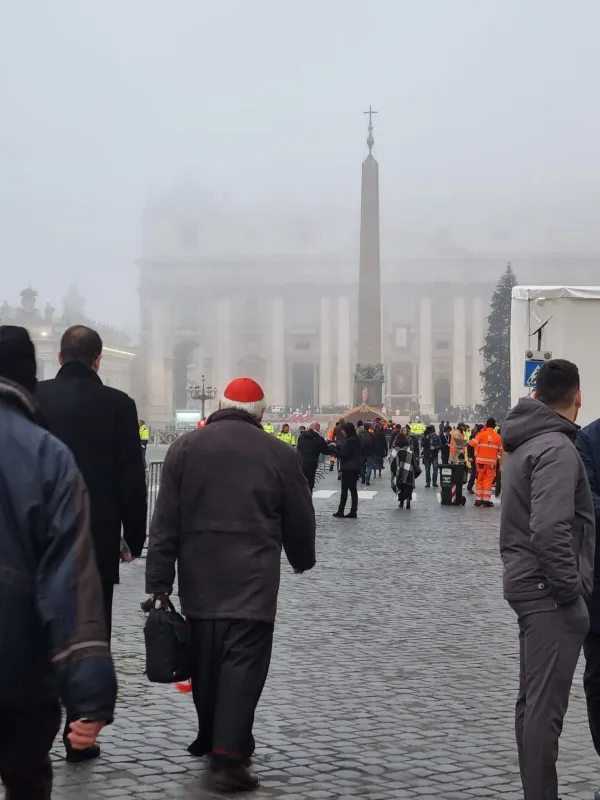 On a foggy morning in Rome, pilgrims make their way to St. Peter's Square on Jan. 5, 2023 for the funeral of Pope Emeritus Benedict XVI. Daniel Ibañez/CNA