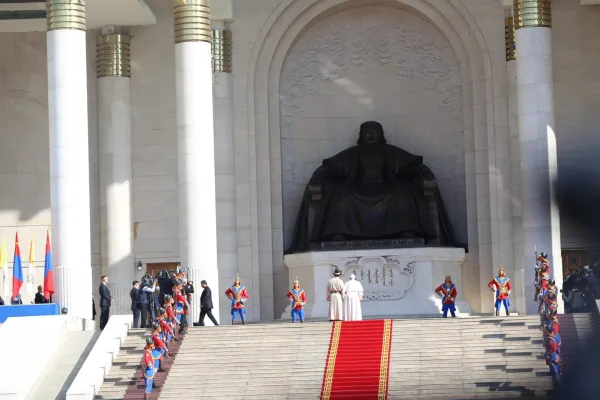 Pope Francis and Mongolian President Ukhnaagiin Khürelsükh stand in front of a large statue of Ghengis Khan. Andrea Gagliarducci/EWTN