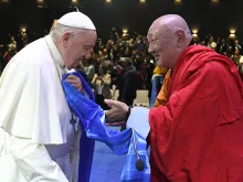 Khamba Nomun Khan, the head of the Gandan Monastery in Ulaanbaatar, accompanied Pope Francis as he made his entrance at the interreligious dialogue event at the Hun Theater in Mongolia on Sept. 3, 2023.