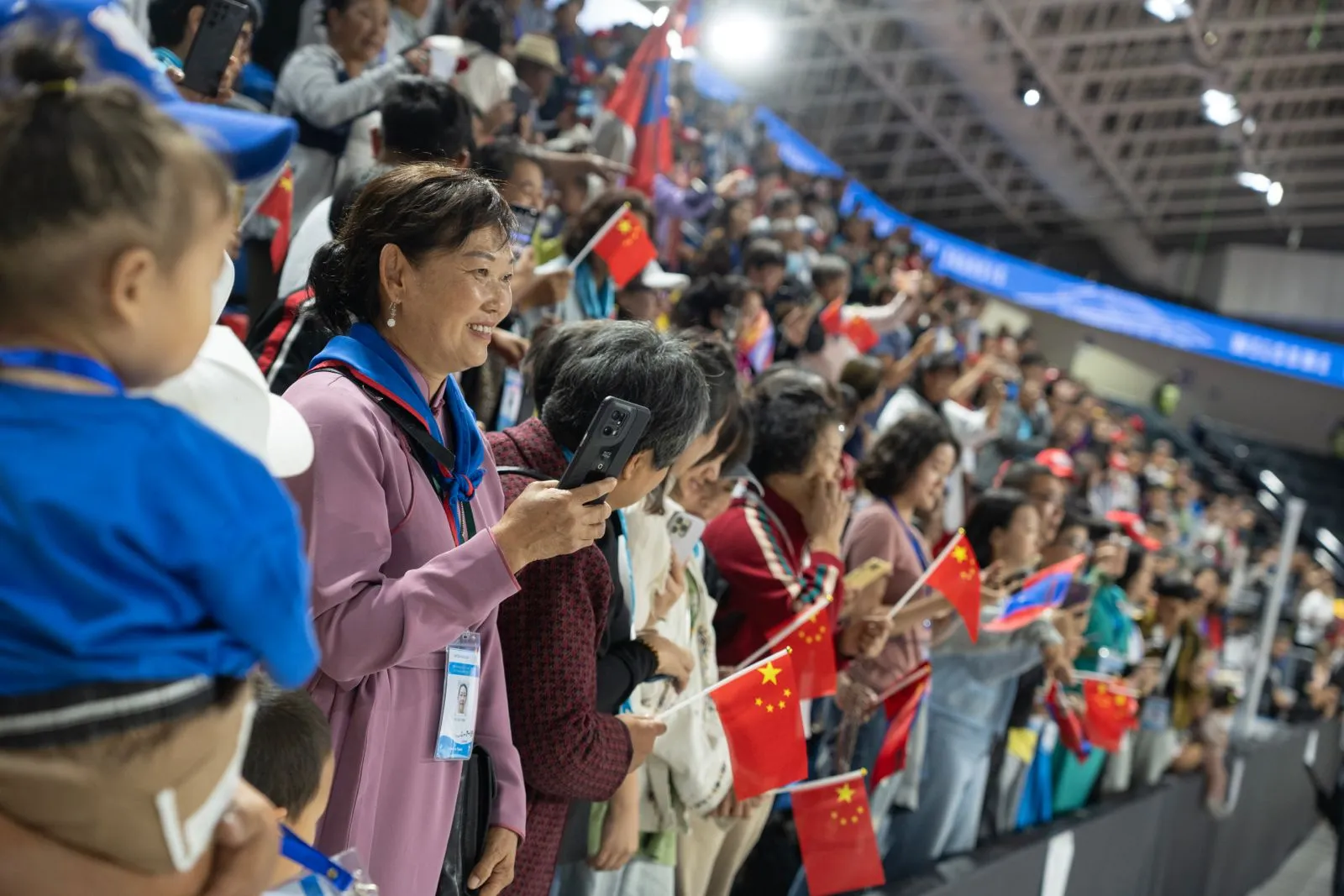 Catholics hold Chinese flags at Pope Francis' Mass in Mongolia's Steppe Arena in Ulaanbaatar on Sept. 4, 2023.?w=200&h=150