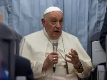 Pope Francis speaks during a press conference aboard the papal plane from Marseille, France, to Rome on Sept. 23, 2023, at the conclusion of a two-day visit to the southern French port city to take part in the Mediterranean Encounter, a meeting of young people and bishops.