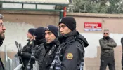 Turkish police stand guard outside the scene of an armed attack at a Catholic church in Istanbul, Turkey, on Jan. 28, 2024.