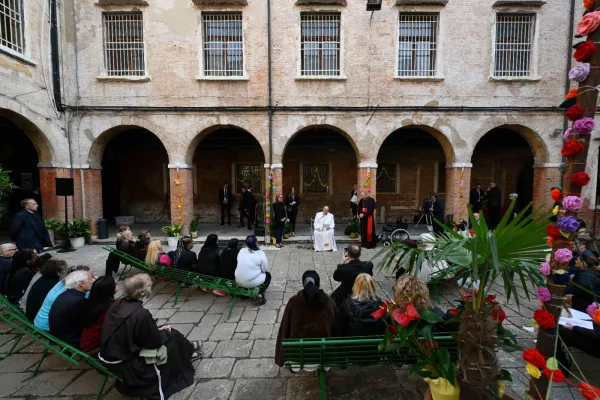 Pope Francis meets with female inmates gathered in the intimate courtyard of the Women's Prison on the Island of Giudecca in Venice, Italy, on April 28, 2024. Credit: Vatican Media
