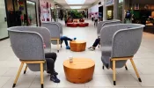 Young people use mobile devices in isolation from each other at Willowbrook Mall in Langley, British Columbia. In their pastoral letter on social media, the Canadian bishops suggest fasting from screens once a week and taking a “Technology Sabbath.”